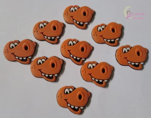 Aplique Mini Carinha Dinossauro de borracha - pct c/10 unid