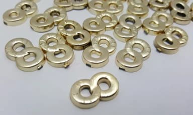 Aplique Símbolo do Infinito Dourado de 1,9cm - 20 unidades