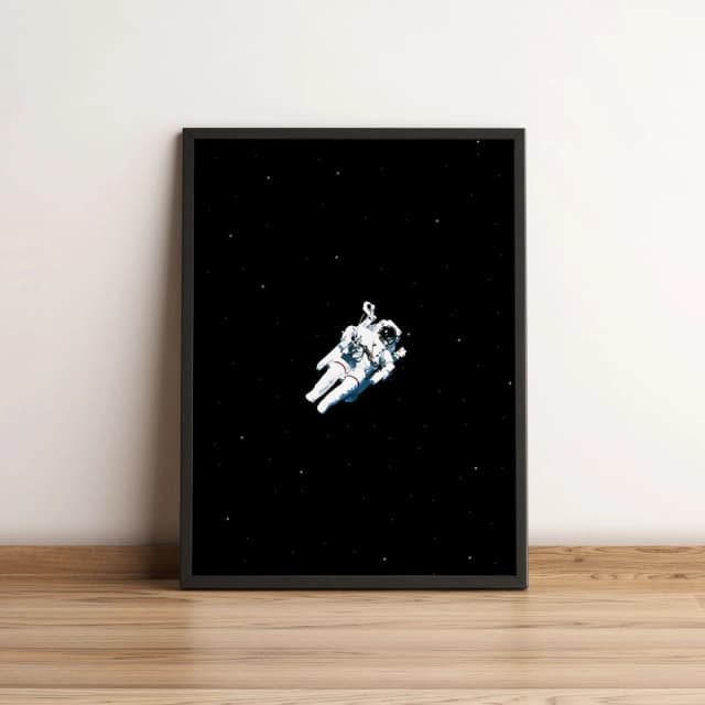 Quadro Astronauta Voando no Espaço 60
